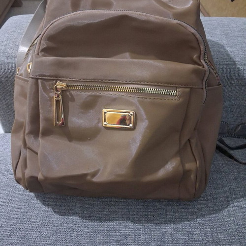 Backpack like new brown with gold zippers
