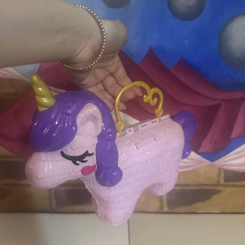 Polly Pocket Unicorn Party Playset used by Mattel