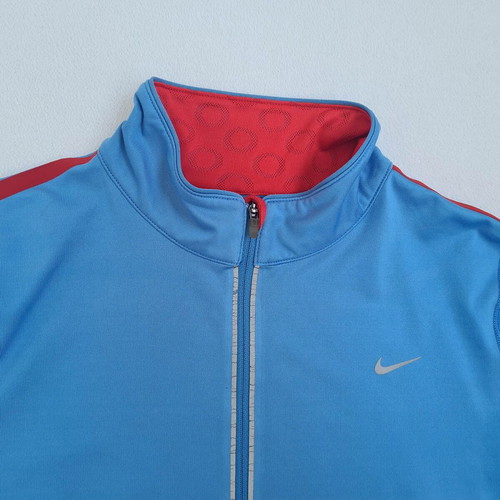 Nike Dri-Fit women's running sports shirt size L with pockets