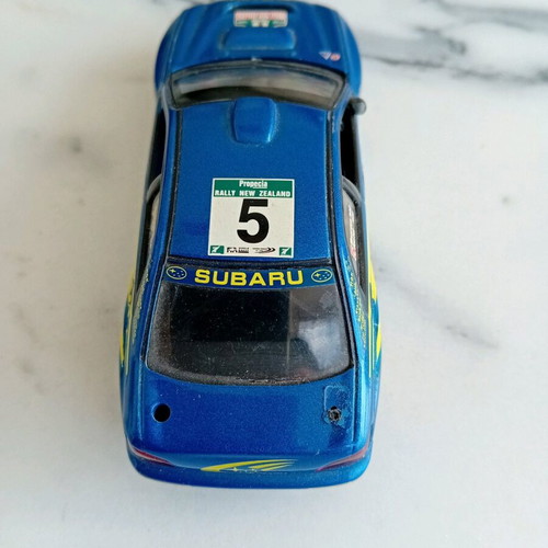 Subaru Impreza WRC toy car used, metal and plastic