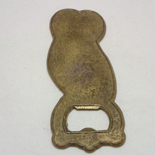 Vintage owl bottle opener made of enamel and brass like new