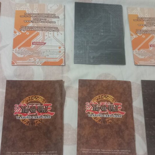 Yu-Gi-Oh! rule books and deck zones, like new, set of 14 each
