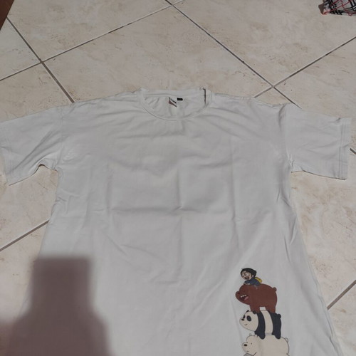 White short-sleeve T-shirt with figures size S like new