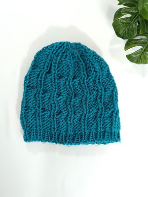 Knitted turquoise beanie like new, one size
