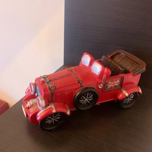 Vintage car in red color like new
