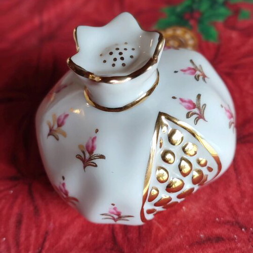 Porcelain pomegranate charm like new with gold leaf detail
