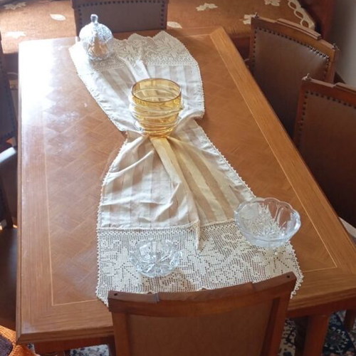 Wooden dining set used with leatherette chairs