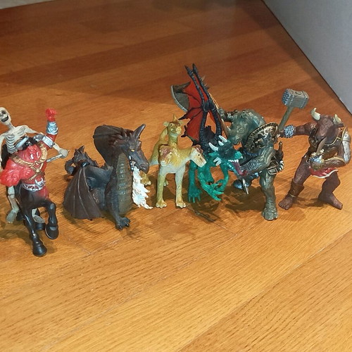 Figures of warriors, dragons and monsters used