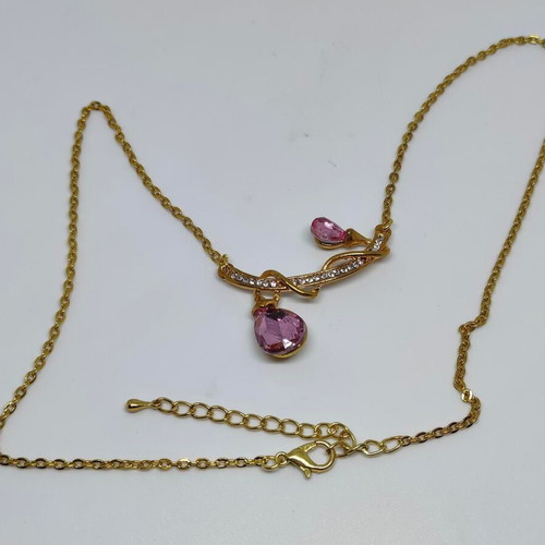 Pendant with pink crystals and gold chain like new