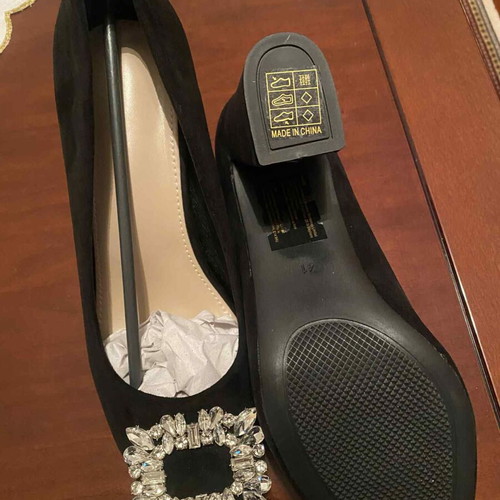 Black pumps with decorative buckle, new, size 41