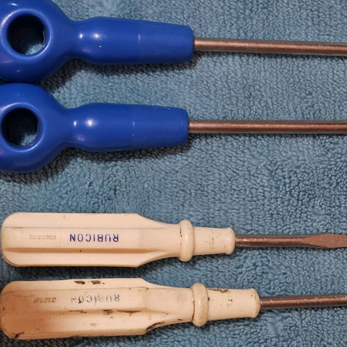 Hand tool set used with screwdrivers, pliers, hammer and work gloves