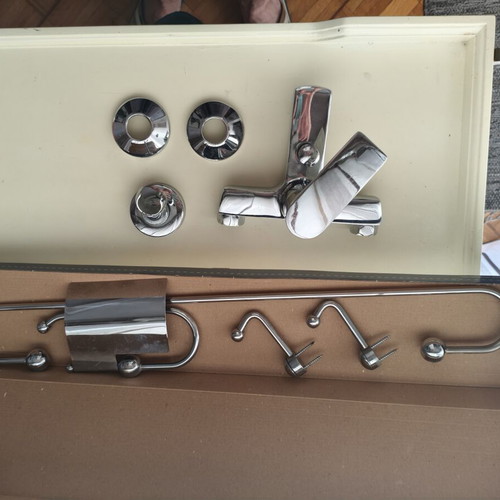 Bathroom faucet used with metal shower holder and soft-touch handle