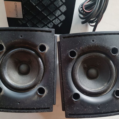 Creative surround speakers like new