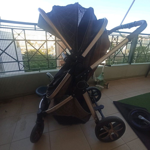 Multifunctional stroller used, foldable in two parts, beige brown gold