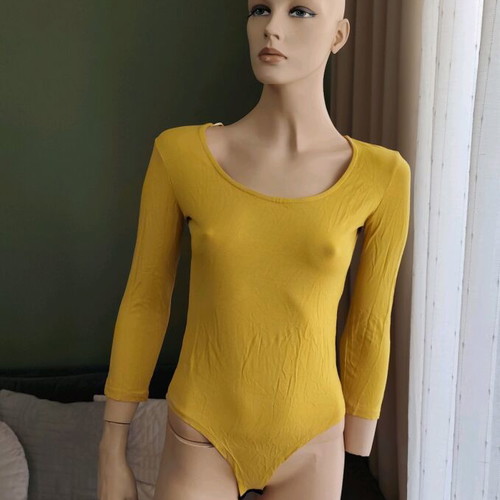 Bodysuit size M/L like new with 3/4 sleeve and snap buttons