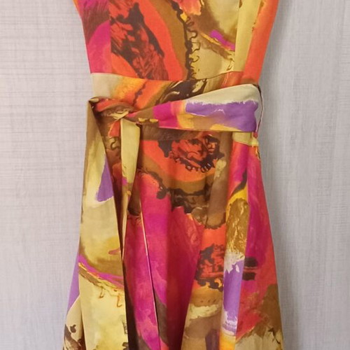 Evening strapless dress with belt in warm shades
