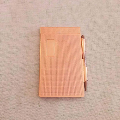 Vintage metal pocket notebook with integrated pencil used 1940-1950