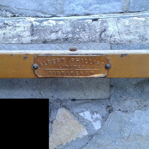 Iron bed used, early 20th century with brass details