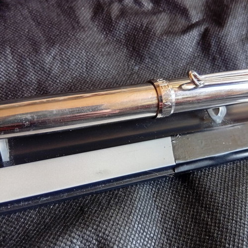 Parafernalia pen used, metal chrome finish, 1980s design