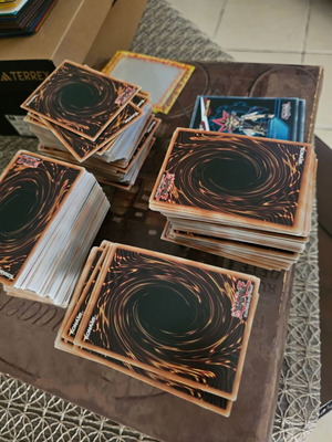 Yu Gi Oh collection like new with over 500 cards, sleeves, and 2 Ultra Pro deck boxes