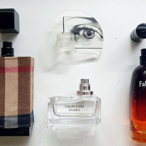 Empty Dior Fahrenheit, Calvin Klein Woman, Burberry London perfume bottles used