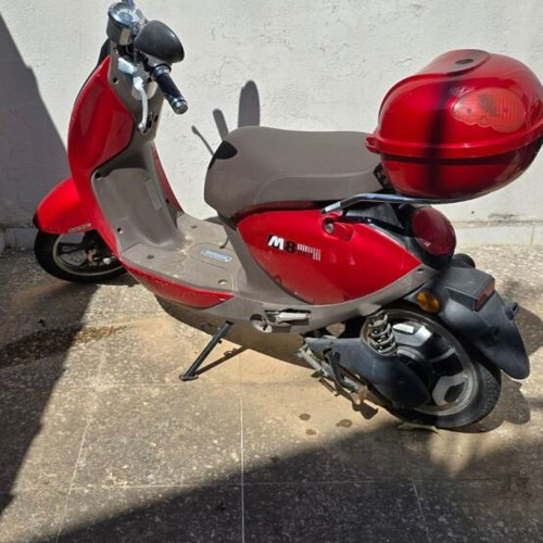 Red electric scooter for repair or spare parts
