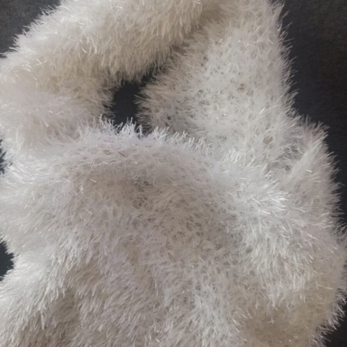 White scarf like new with silver sparkles and decorative beads