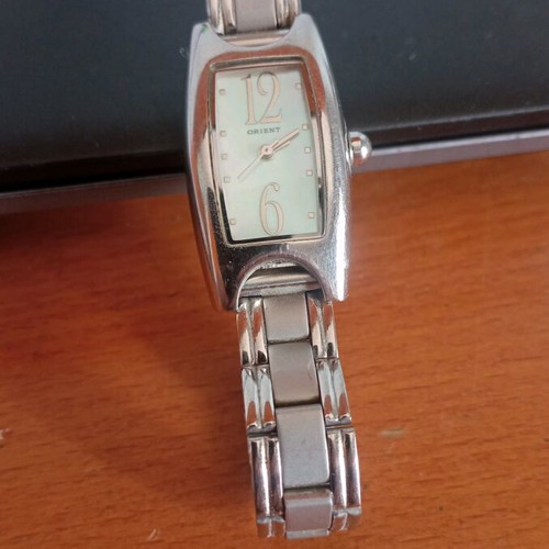 Orient women's wristwatch used, silver, quartz