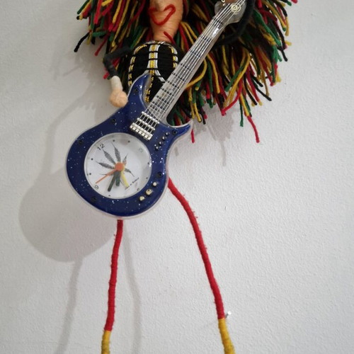 Vintage Table Clock Rastaman Figurine with Guitar like new