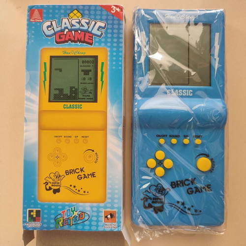 Vintage Tetris handheld game from the 90s, blue, new