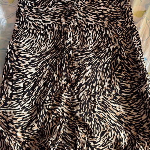 Leopard skirt like new with front button details, size XS