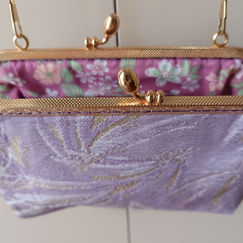 Vintage shoulder bag new in purple and gold shades with floral lining