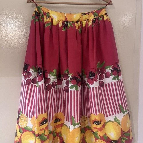 Manolo midi skirt used with floral and fruit print, size M