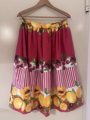 Manolo midi skirt used with floral and fruit print, size M