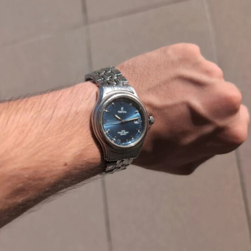 Festina vintage wristwatch with blue sunburst dial