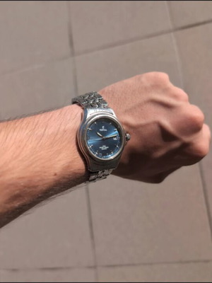 Festina vintage wristwatch with blue sunburst dial