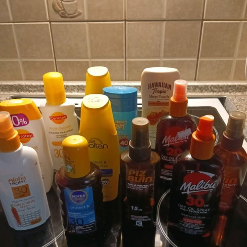 Sunscreens and after sun almost full, like new condition