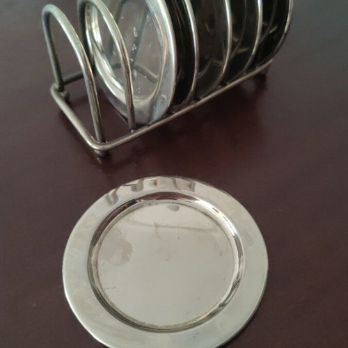 Vintage metal coaster set with wire holder