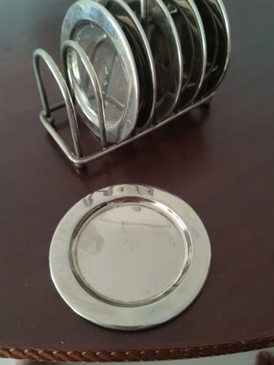 Vintage metal coaster set with wire holder