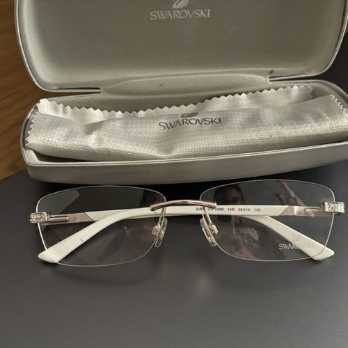 Swarovski women's eyeglasses new, white with crystals
