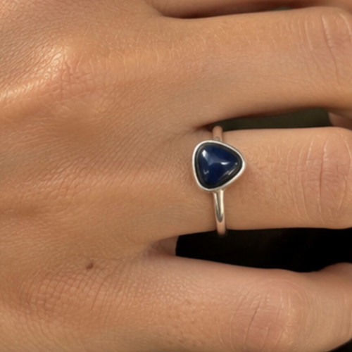 Silver ring with dark blue agate stone