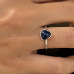 Silver ring with dark blue agate stone