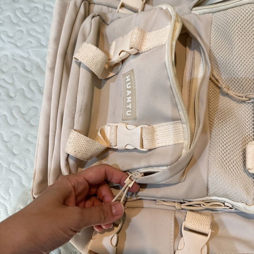 Beige travel bag backpack, used