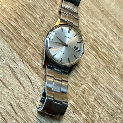 Seiko Vintage wristwatch used with original bracelet, white dial
