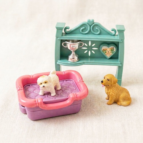 Lot of dog figures and accessories with shelf, bed, and cup