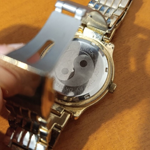 Daniel Klein wristwatch like new, gold bracelet, women's