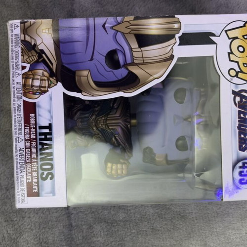 Thanos Endgame and Duffy Duck Funko Pop used