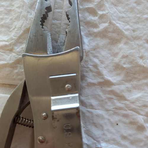 Pocket multitool used, stainless steel with case