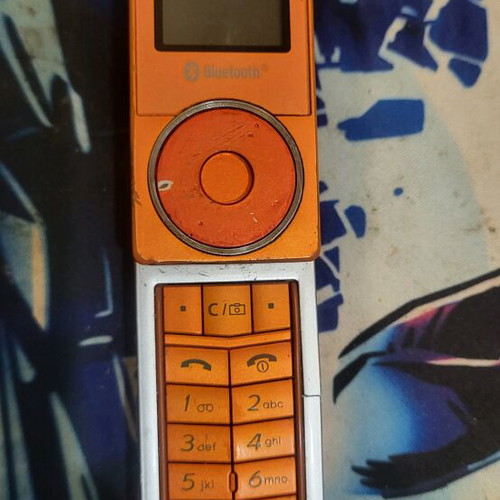 Samsung SGH-X830 used orange phone with charger
