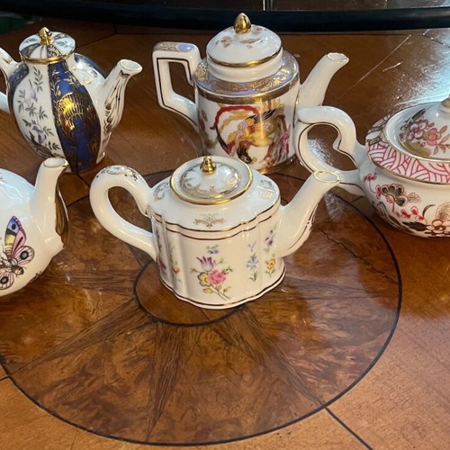 Porcelain miniature collectible teapots like new, set of 5